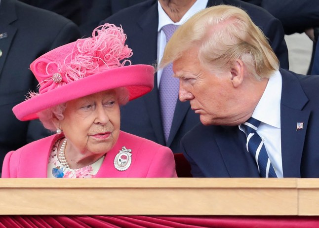 (FILES) In this file photo taken on June 5, 2019 Britain's Queen Elizabeth II (L) reacts as she sits with US President Donald Trump an event to commemorate the 75th anniversary of the D-Day landings, in Portsmouth, southern England. - Queen Elizabeth II, the longest-serving monarch in British history and an icon instantly recognisable to billions of people around the world, has died aged 96, Buckingham Palace said on September 8, 2022. Her eldest son, Charles, 73, succeeds as king immediately, according to centuries of protocol, beginning a new, less certain chapter for the royal family after the queen's record-breaking 70-year reign. (Photo by Chris Jackson / POOL / AFP) (Photo by CHRIS JACKSON/POOL/AFP via Getty Images)