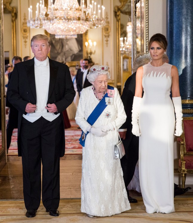 RETRANSMITTED CORRECTING BYLINE (left to right) US President Donald Trump, Queen Elizabeth II and Melania Trump, during a group photo ahead of the State Banquet at Buckingham Palace, London, on day one of US President Donald Trump's three day state visit to the UK. PRESS ASSOCIATION Photo. Picture date: Monday June 3, 2019. See PA story ROYAL Trump. Photo credit should read: Jeff Gilbert/Daily Telegraph/PA Wire