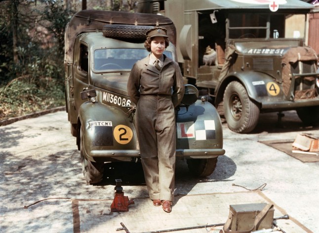 Princess Elizabeth, a 2nd Subaltern in the Auxiliary Territorial Service, standing in front of an L-plated truck, with a medical lorry in the background, Aldershot, Surrey, 1945. (Photo by Official photographer/Imperial War Museums via Getty Images)