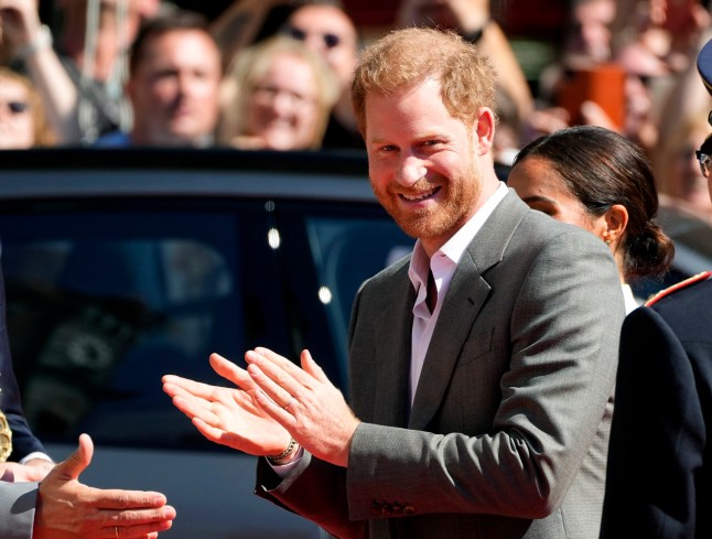 Britain's Prince Harry arrives for a visit at the town hall in Duesseldorf, Germany, Tuesday, Sept. 6, 2022. Prince Harry visits the city as ambassador for the Invictus games, a week-long games for active servicemen and veterans who are ill, injured or wounded, hosted by Duesseldorf next year. (AP Photo/Martin Meissner)