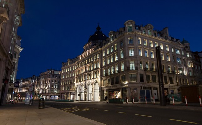 LONDON, ENGLAND - JUNE 21: A view of Regent Street lit up at night showing the Apple Store, on June 21, 2020 in London, United Kingdom. The British government have relaxed coronavirus lockdown laws significantly from Monday June 15, allowing zoos, safari parks and non-essential shops to open to visitors. Places of worship will allow individual prayers and protective facemasks become mandatory on London Transport. (Photo by Jo Hale/Getty Images)