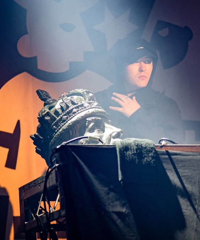 Irish rap group Kneecap performs on stage with stolen severed head of King George V statue
