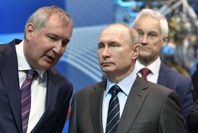 MANDATORY CREDIT Mandatory Credit: Photo by ALEXEY NIKOLSKY/SPUTNIK/KREMLIN POOL/EPA-EFE/REX/Shutterstock (10202610c) Roscosmos State Space Corporation Director General Dmitry Rogozin (L) and Russian President Vladimir Putin (front R) visit the NPO Energomash enterprise developing and producing liquid rocket engines for space launch vehicles in Khimki, Moscow region, Russia, 12 April 2019, on the Cosmonautics Day dedicated to the first manned space flight. On 12 April 1961 Soviet cosmonaut Yuri Gagarin circled the Earth for 108 minutes aboard the Vostok 1 spacecraft. Russian President Vladimir Putin visit the Academician Glushko Science and Production Association Energomash, Khimki, Russian Federation - 12 Apr 2019