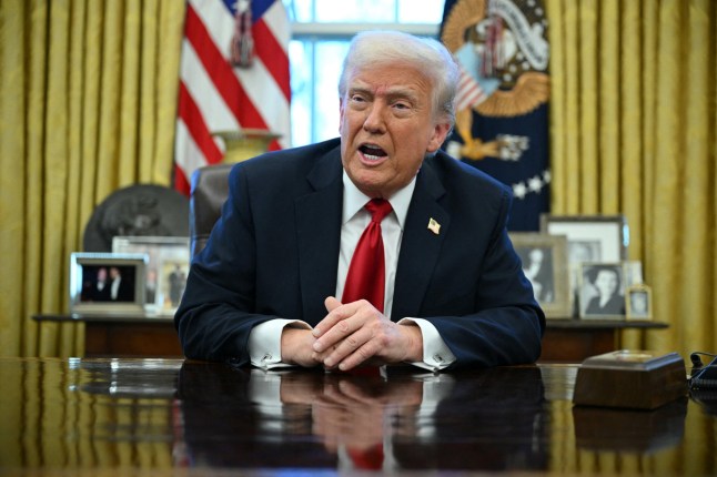 US President Donald Trump announces tariffs on auto imports in the Oval Office of the White House in Washington, DC, on March 26, 2025. Trump announced imposition of 25 percent tariffs on all cars and light trucks not built on US soil. "What we're going to be doing is a 25 percent tariff on all cars that are not made in the United States. If they're made in the United States, it is absolutely no tariff," he announced at the White House. (Photo by Mandel NGAN / AFP) (Photo by MANDEL NGAN/AFP via Getty Images)