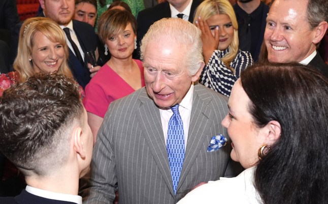 King Charles III speaks to guests during a reception at Buckingham Palace, London, for guests from a wide range of media organisations across the country. Picture date: Wednesday March 26, 2025. PA Photo. Photo credit should read: Aaron Chown/PA Wire